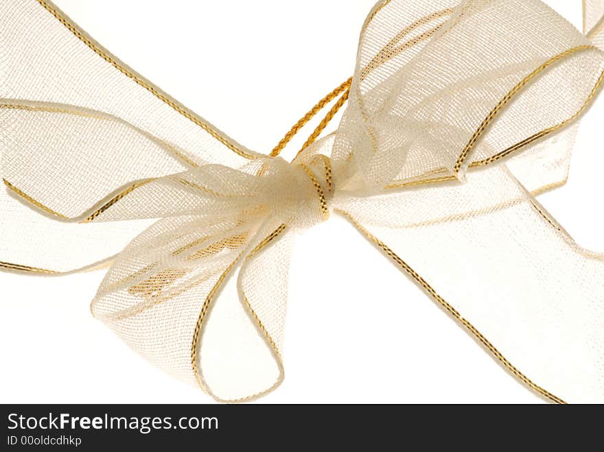 Golden net gift decoration on white background