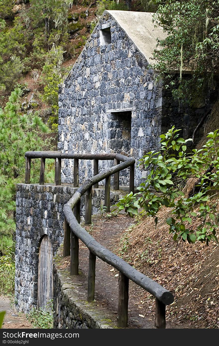 Stone house hidden in the middle of the forest. Stone house hidden in the middle of the forest