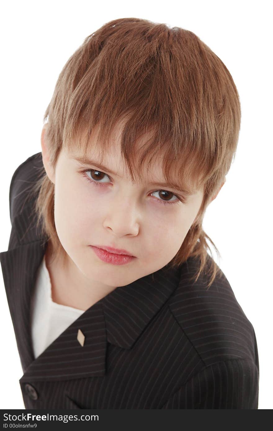 Close-up of boy in business suit. Shot in studio. Close-up of boy in business suit. Shot in studio.