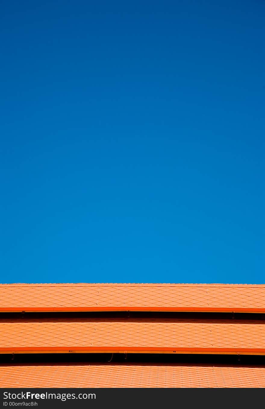 Blue sky orange tiles