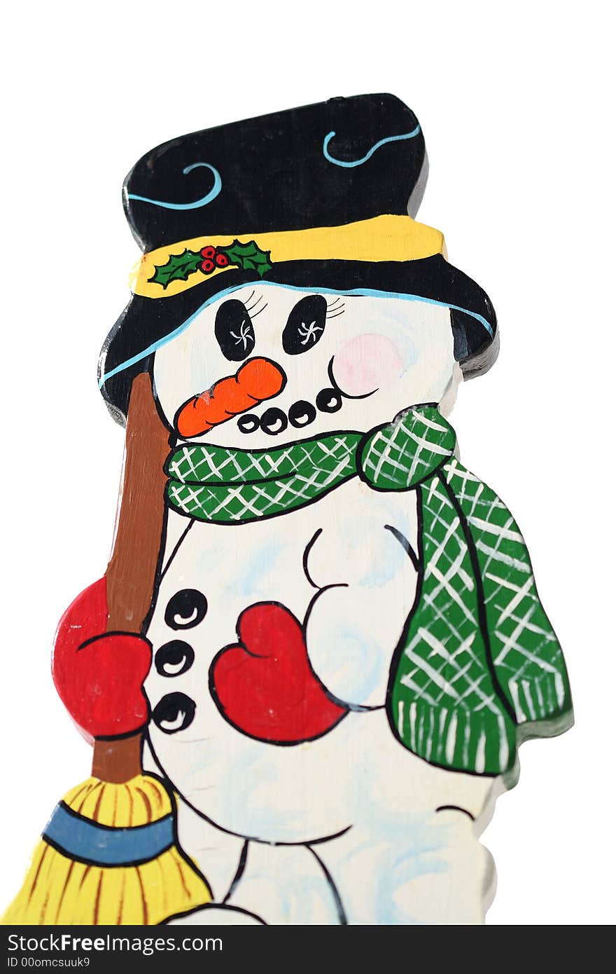 A wood carved colorful snowman isolated over white. A wood carved colorful snowman isolated over white