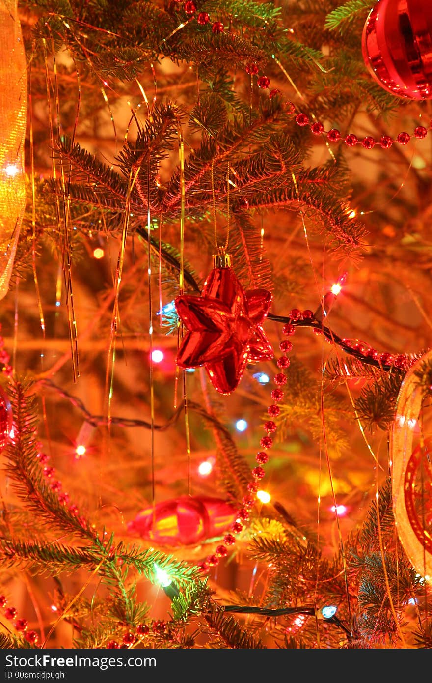 Lights and a red star on a xmas tree. Lights and a red star on a xmas tree