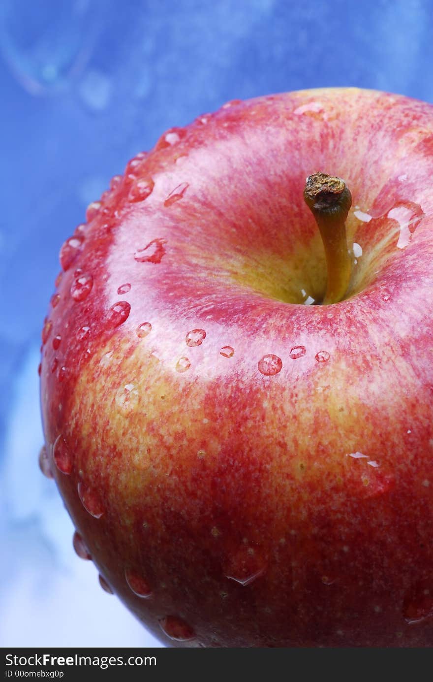 Water drops on red apple