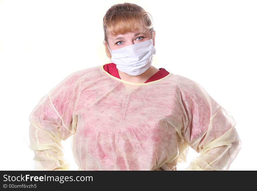 Nurse with blue eyes with face mask. Its flu season. Nurse with blue eyes with face mask. Its flu season.