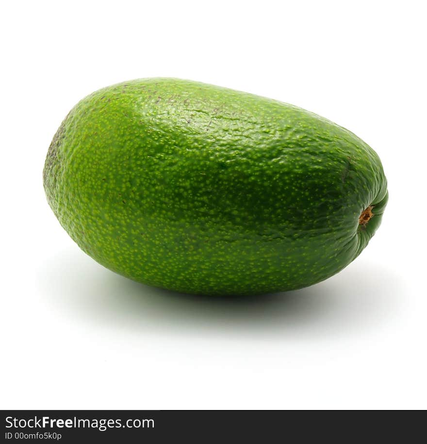 Single avocado isolated on white background