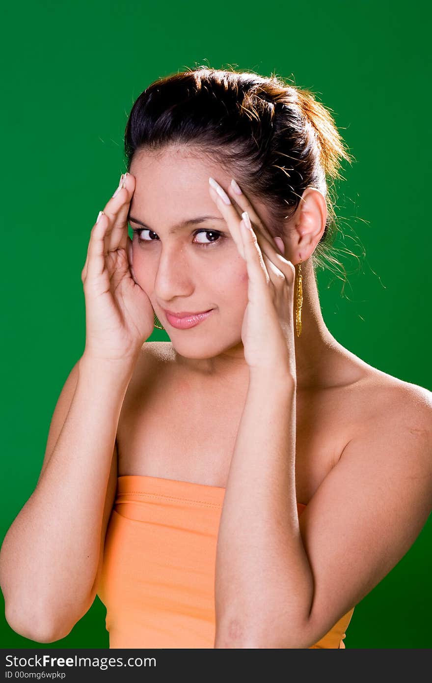 Facial close up of a beautiful eurasian woman smile with cup hands. Facial close up of a beautiful eurasian woman smile with cup hands