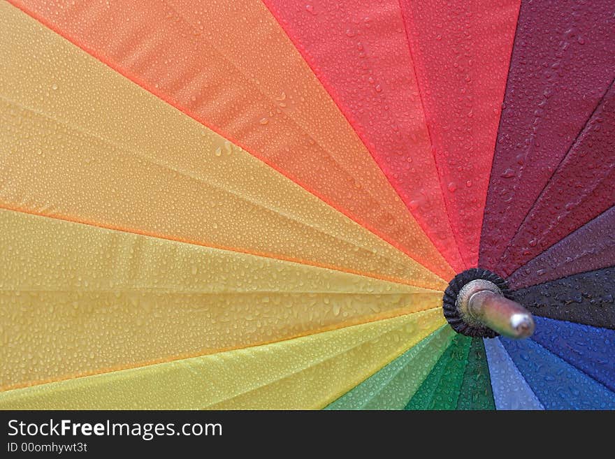 Close up from a wet umbrella as background