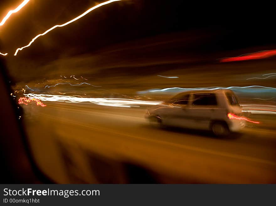 Moving abstract lights from inside a car. Moving abstract lights from inside a car