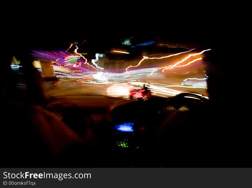 Moving abstract lights from inside a car. Moving abstract lights from inside a car