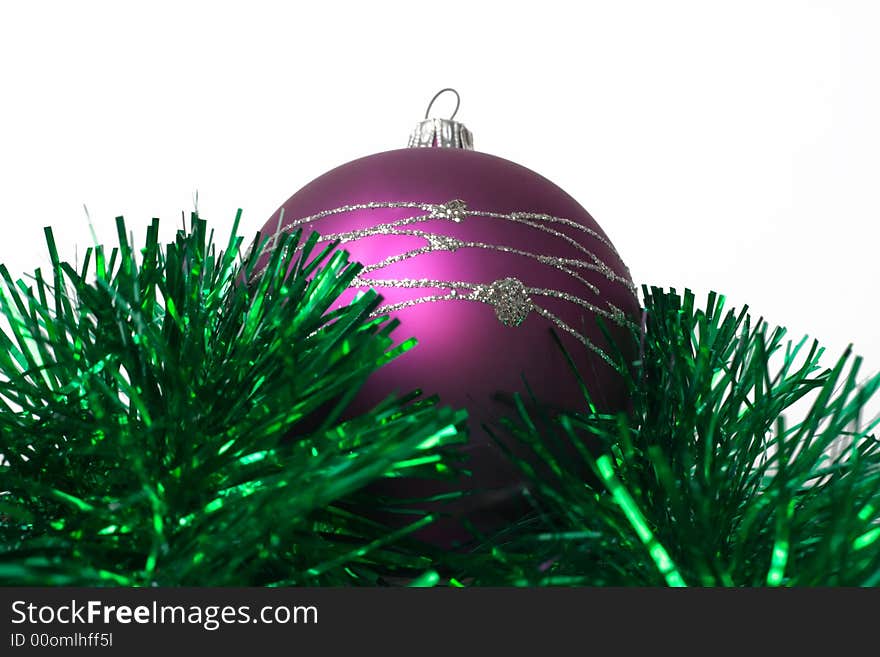 Lilac fur-tree toy on green garland