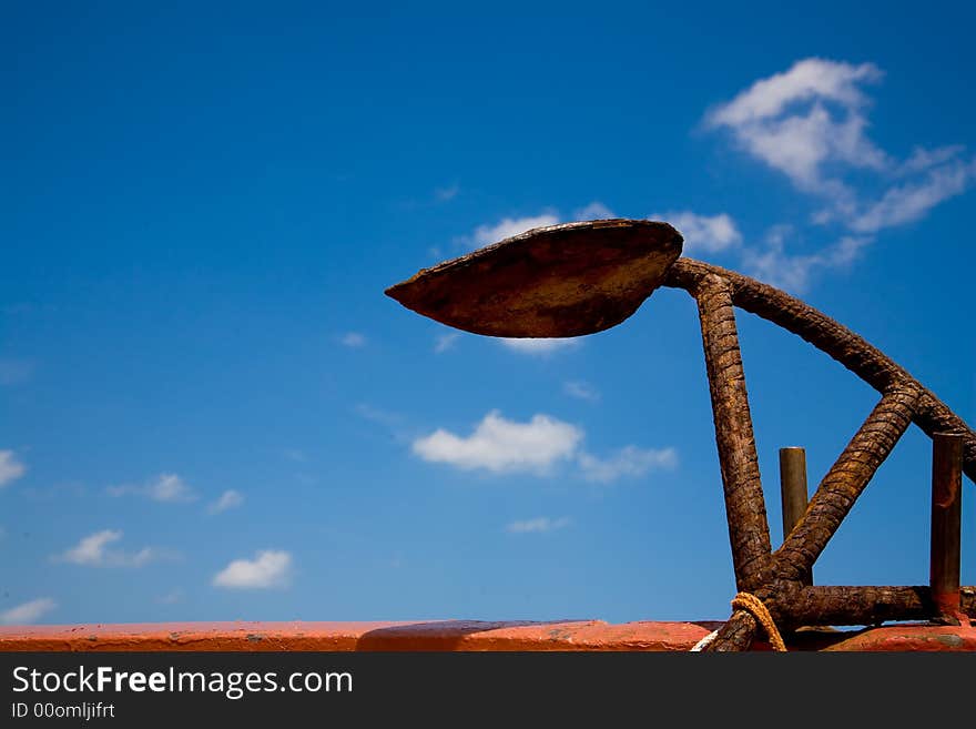 Sea anchor in front of blue sky. Sea anchor in front of blue sky