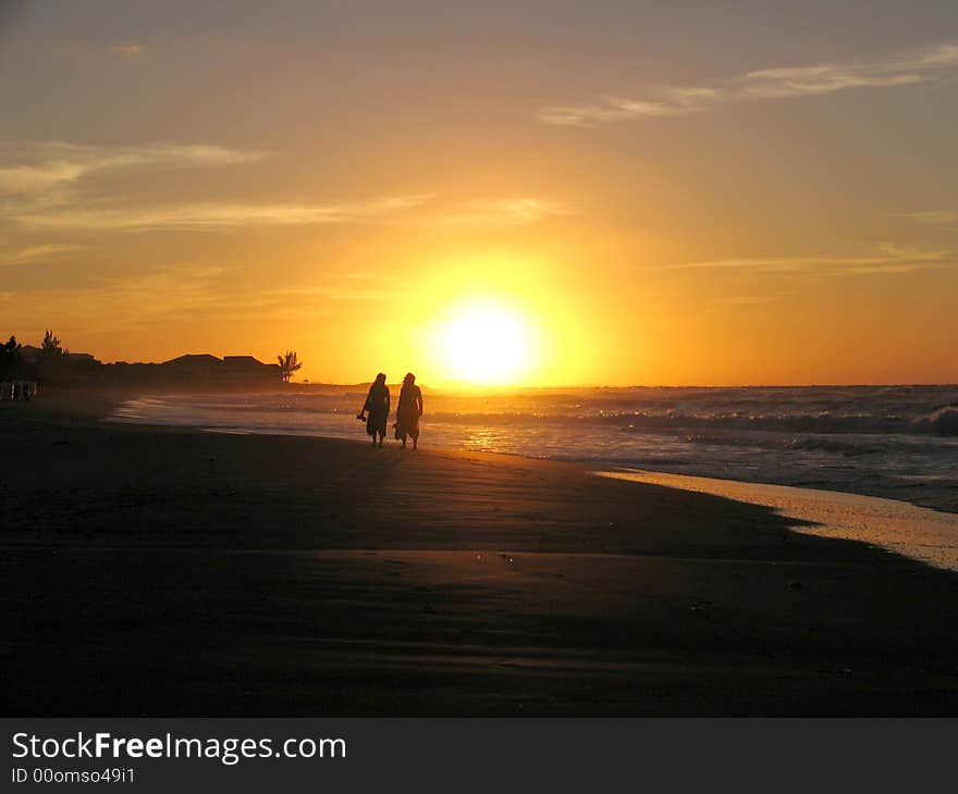 2 people walking at dawn. 2 people walking at dawn