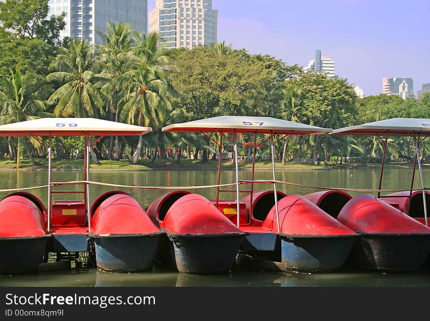 Pleasureboats in Lumpini Park in downtown Bangkok, Thailand. Pleasureboats in Lumpini Park in downtown Bangkok, Thailand