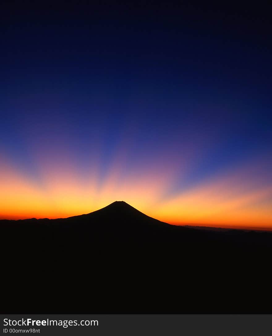 Orange rays of light over Mt. Fuji. Orange rays of light over Mt. Fuji