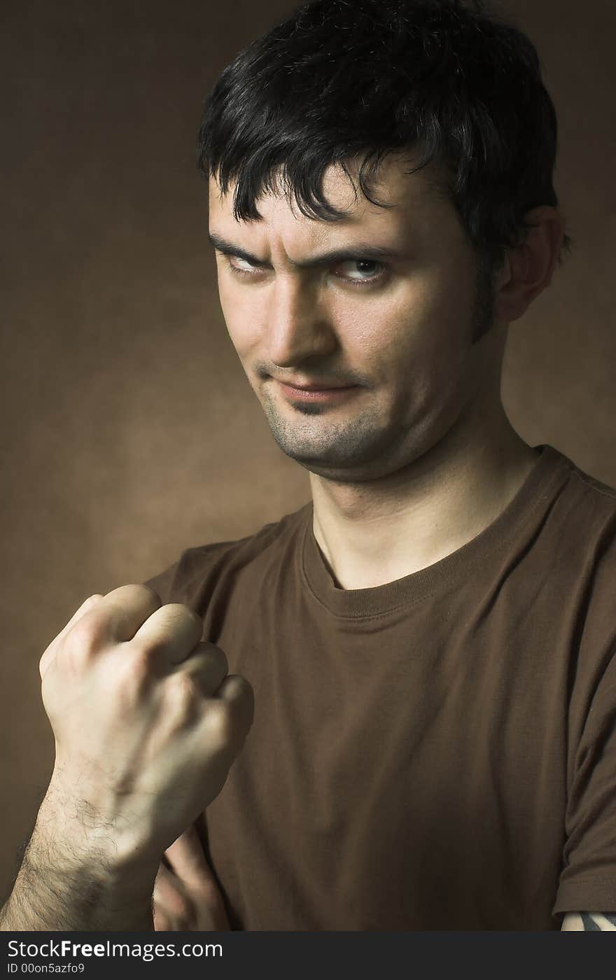 The man threatening by a fist