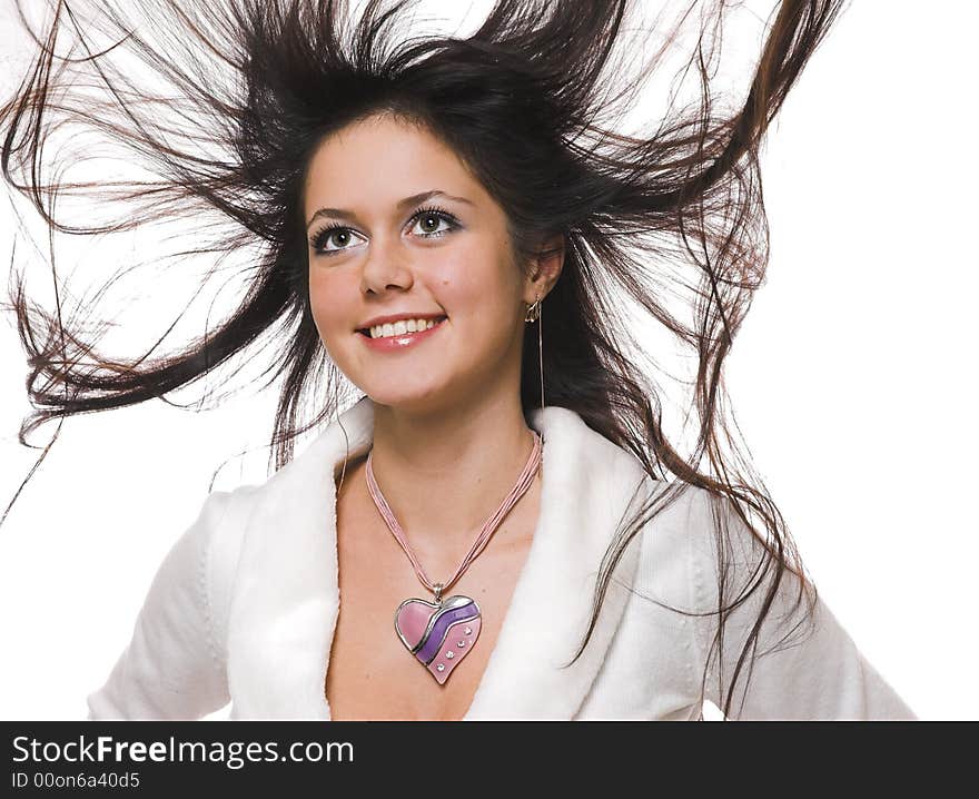 The beautiful brunette with in flying hair