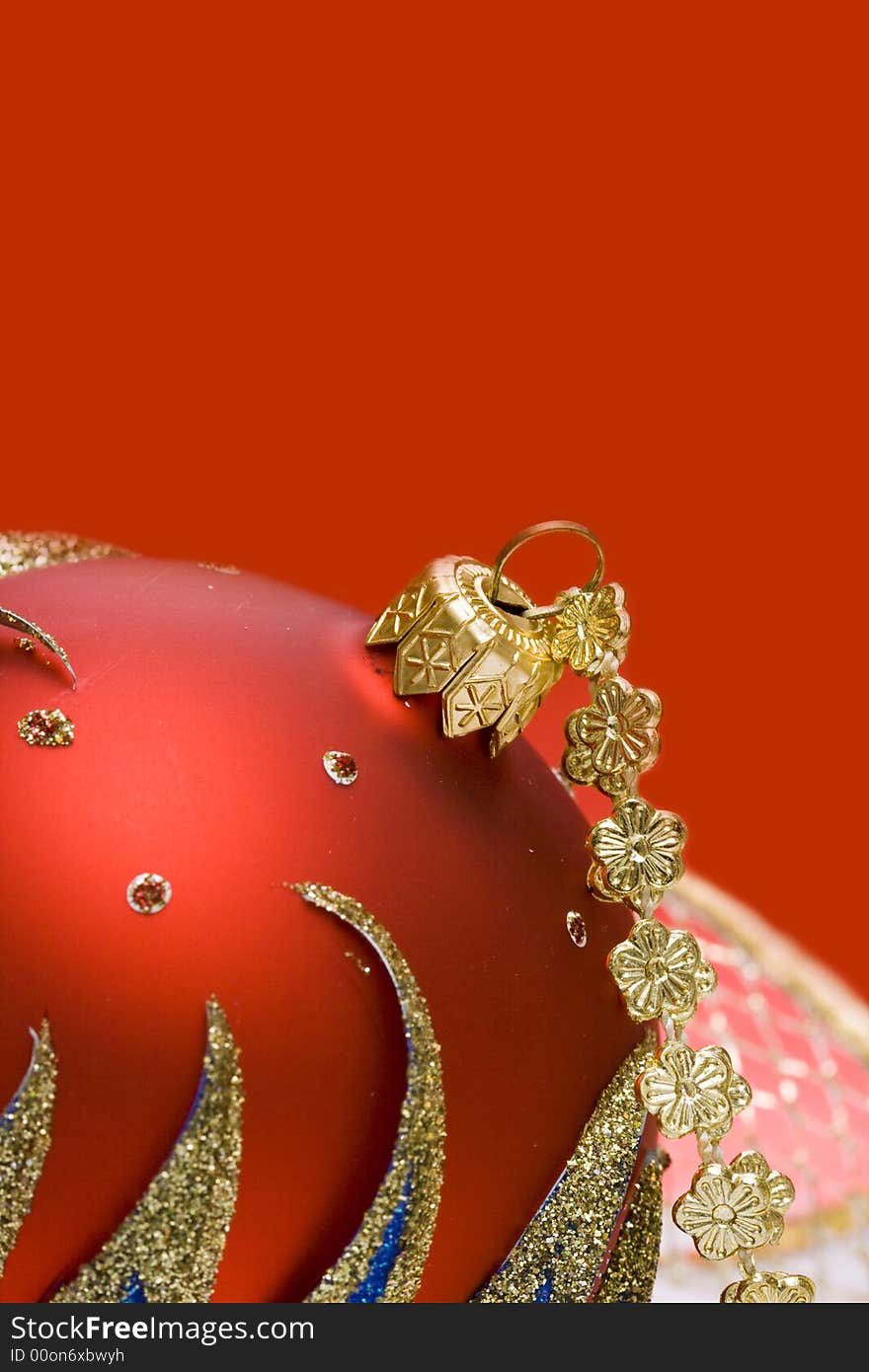 Christmas ball on red background