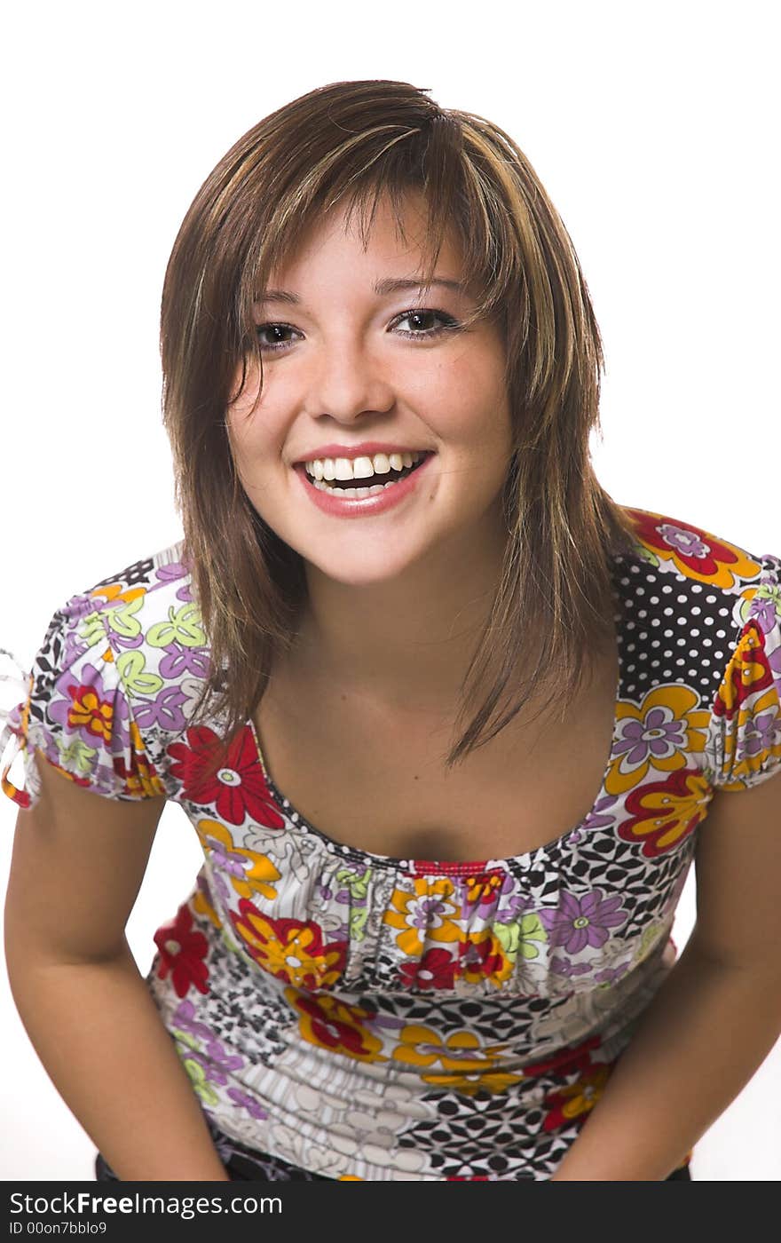 Portrait of a smiling girl on a white background