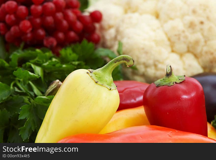 An image of cabbage amongst various vegetables. An image of cabbage amongst various vegetables