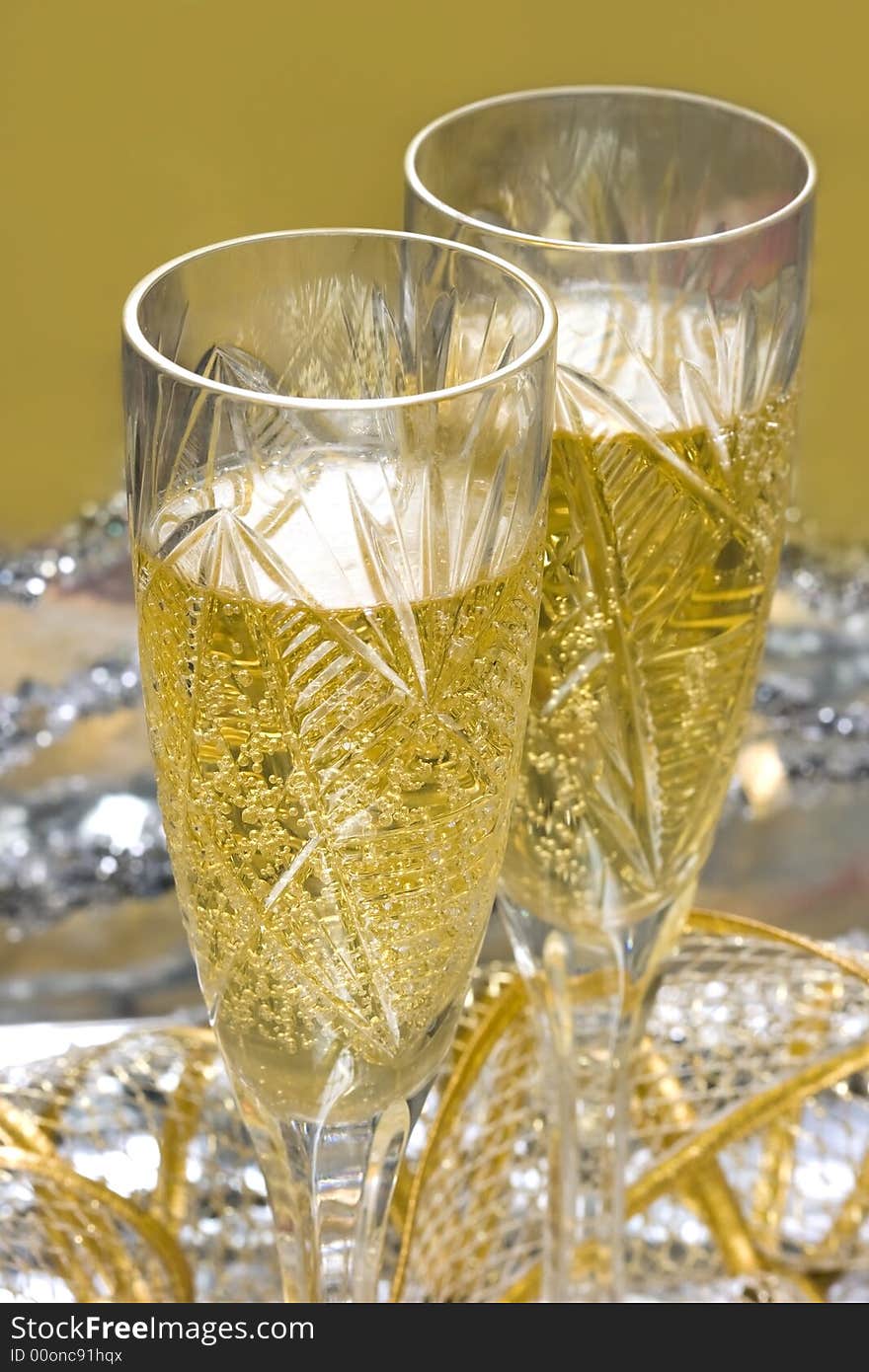 Glasses with champagne on celebration table