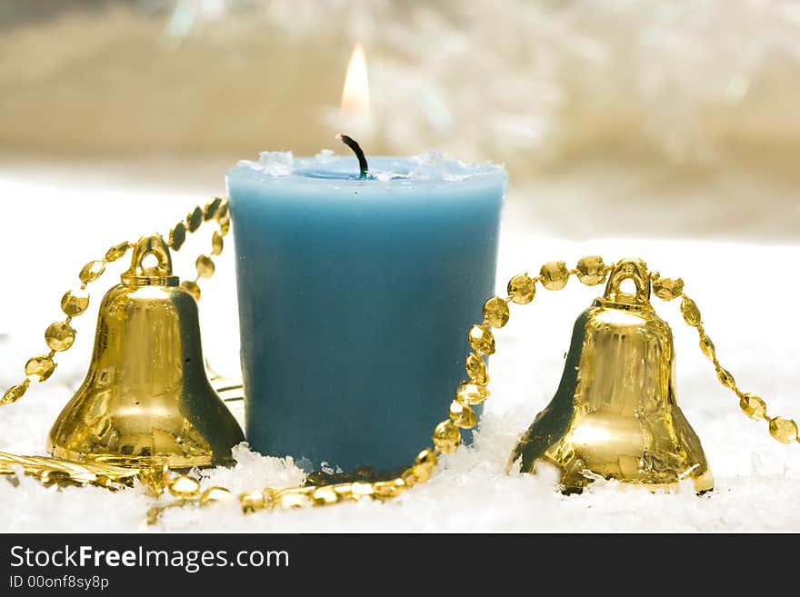 Festive new-year candle with handbells