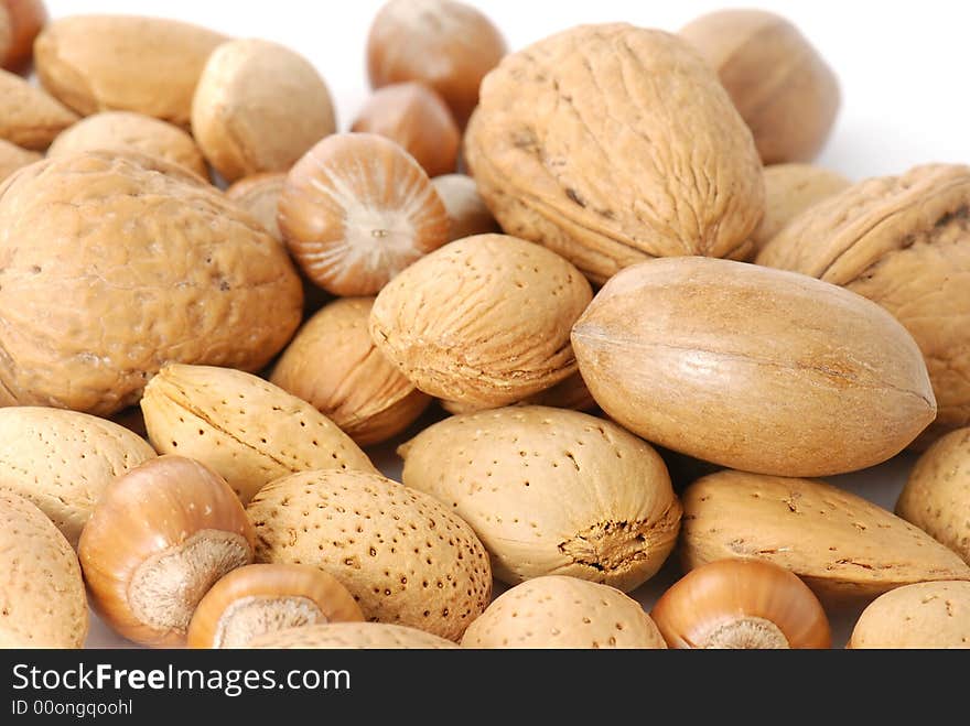 Mix of different types of nuts in closeup. Mix of different types of nuts in closeup