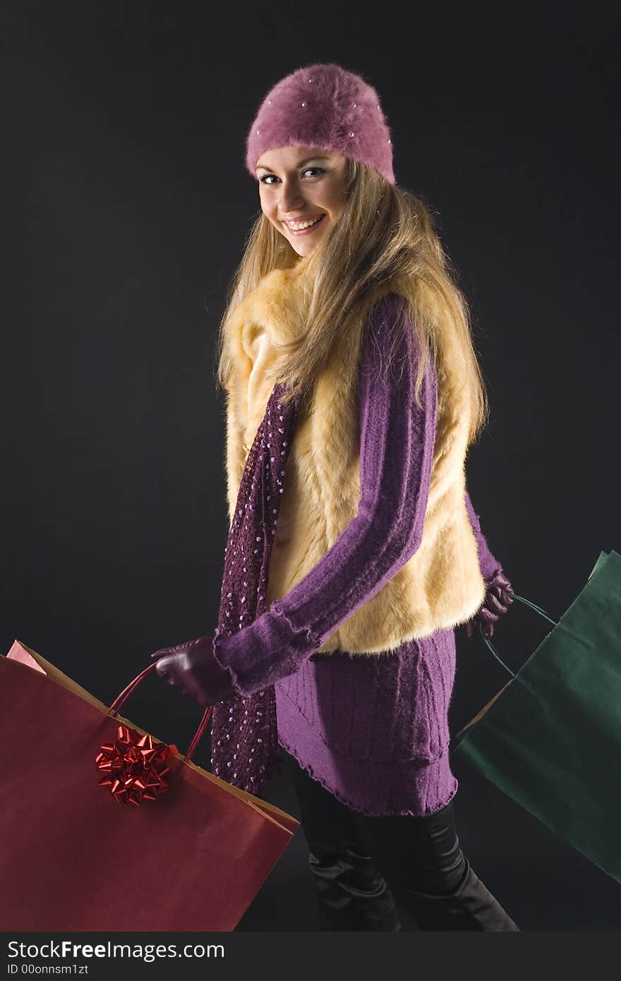 Young woman with shopping bags. Young woman with shopping bags.