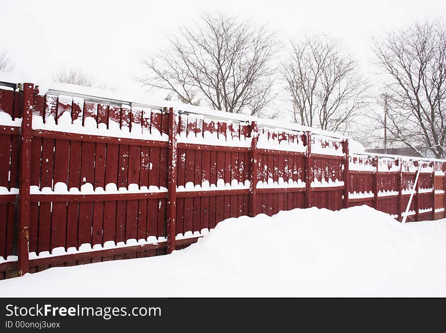 Red fence in snow day