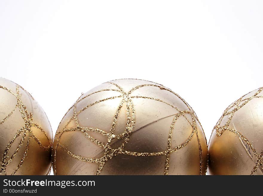 Christmas gold balls,decoration on the white background