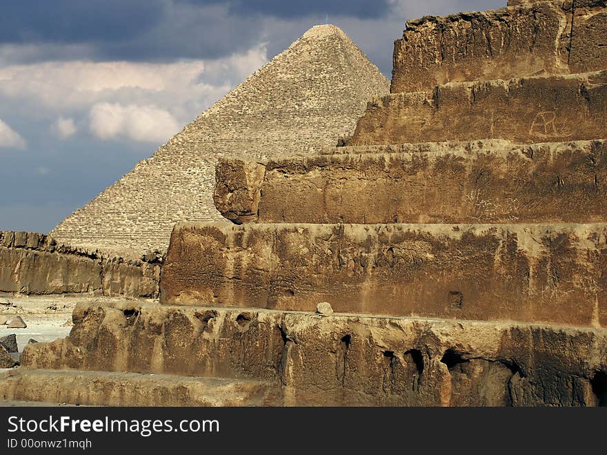 Sphinx on background of the egyptian pyramid