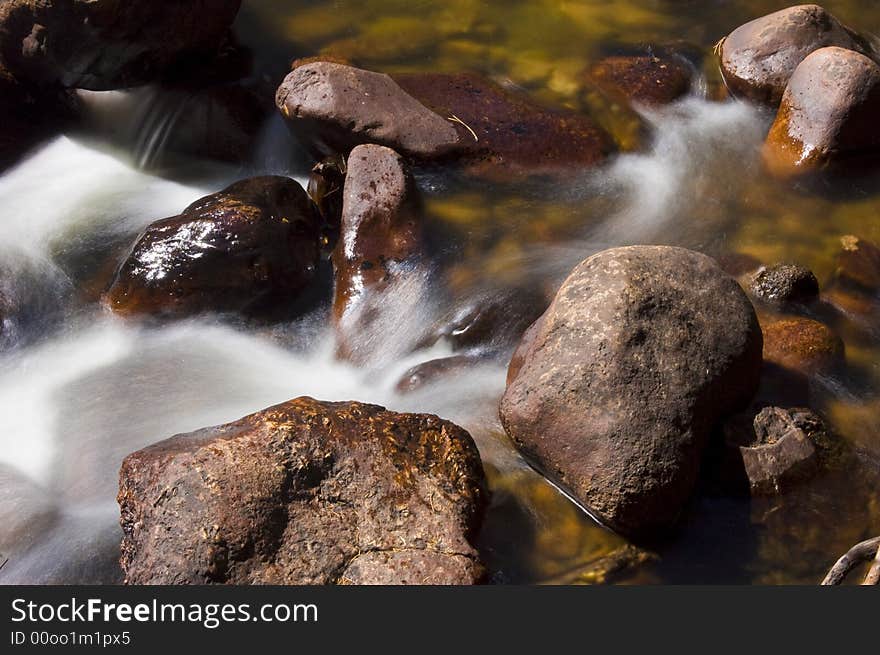 Water moves along a mountain stream in Rocky Mountain National Park