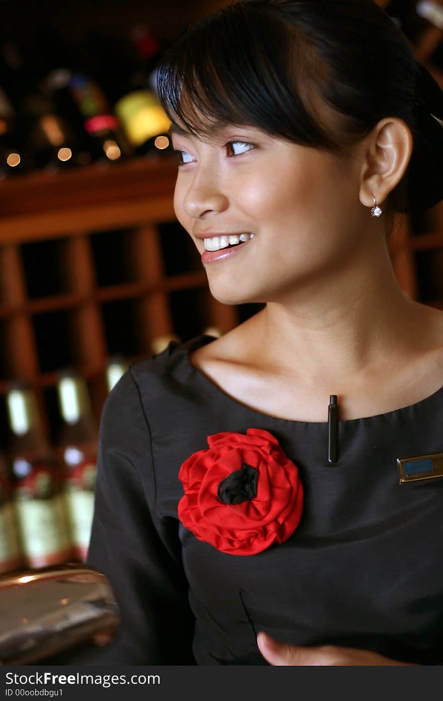 portrait of server or bartender smiling. portrait of server or bartender smiling