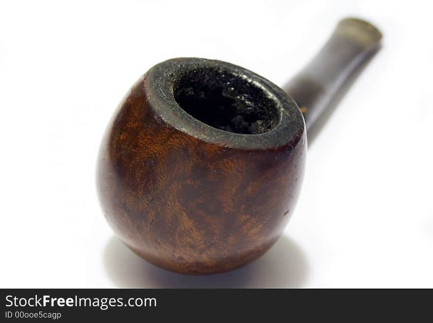 Old smoked English briar pipe. Old smoked English briar pipe