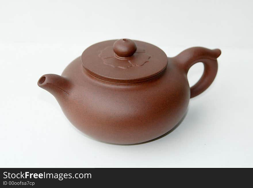 A exquisite brown zisha  tea pot. A exquisite brown zisha  tea pot