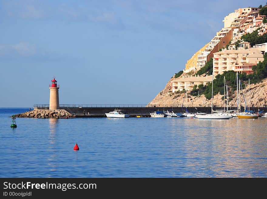 Spanish port and lighthouse at majorca