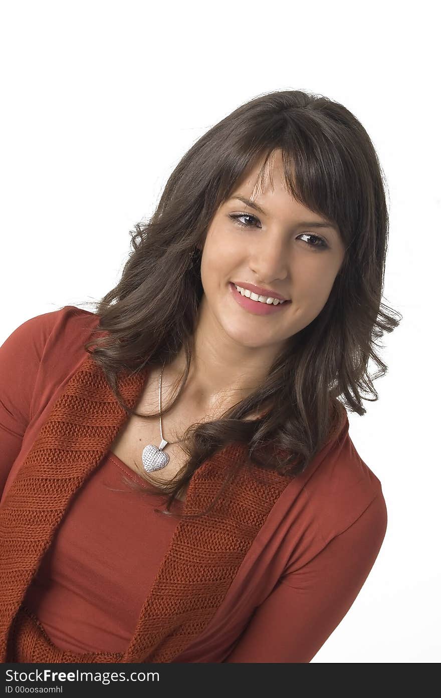 Pretty young woman in red smiling