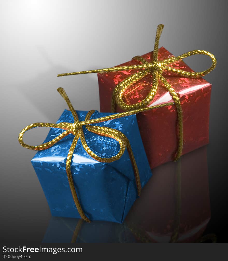 A gift box wrapped up with a red bow