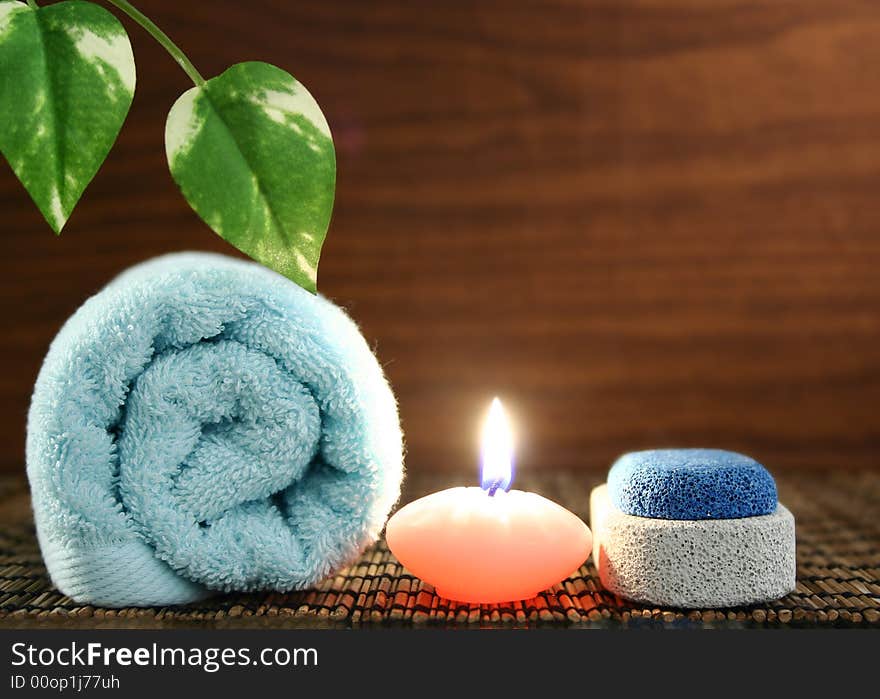 Towel,candle,pumice and leaf. Towel,candle,pumice and leaf