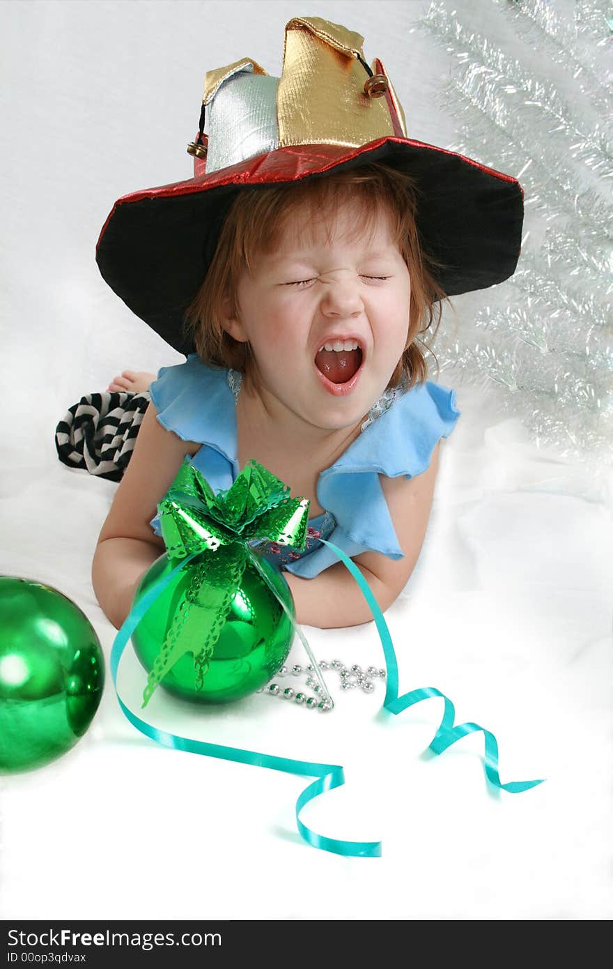 Beautiful little girl with christmas decoration