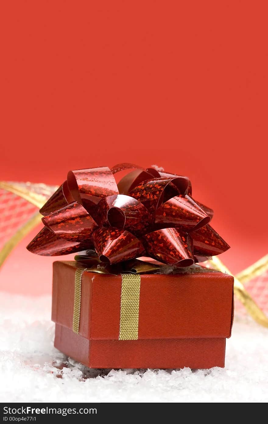 Gift box on red background