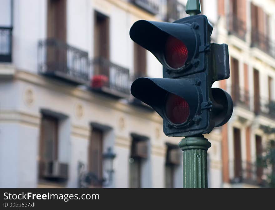 Traditional old traffic lights, still in use in Madrid.