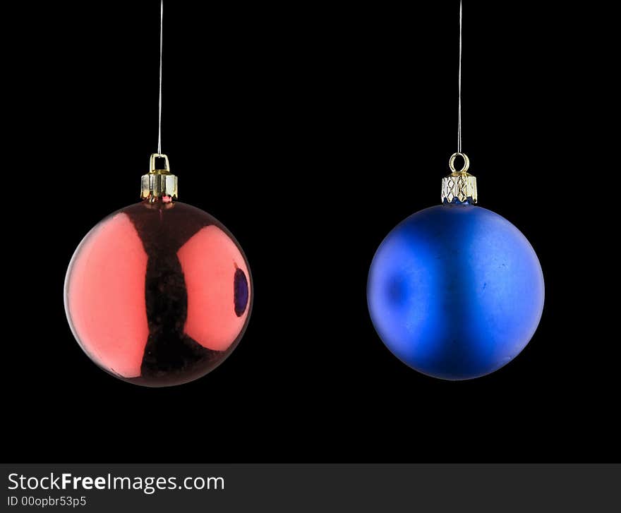 Red and Blue Christmas Baubles against Black Background. Red and Blue Christmas Baubles against Black Background