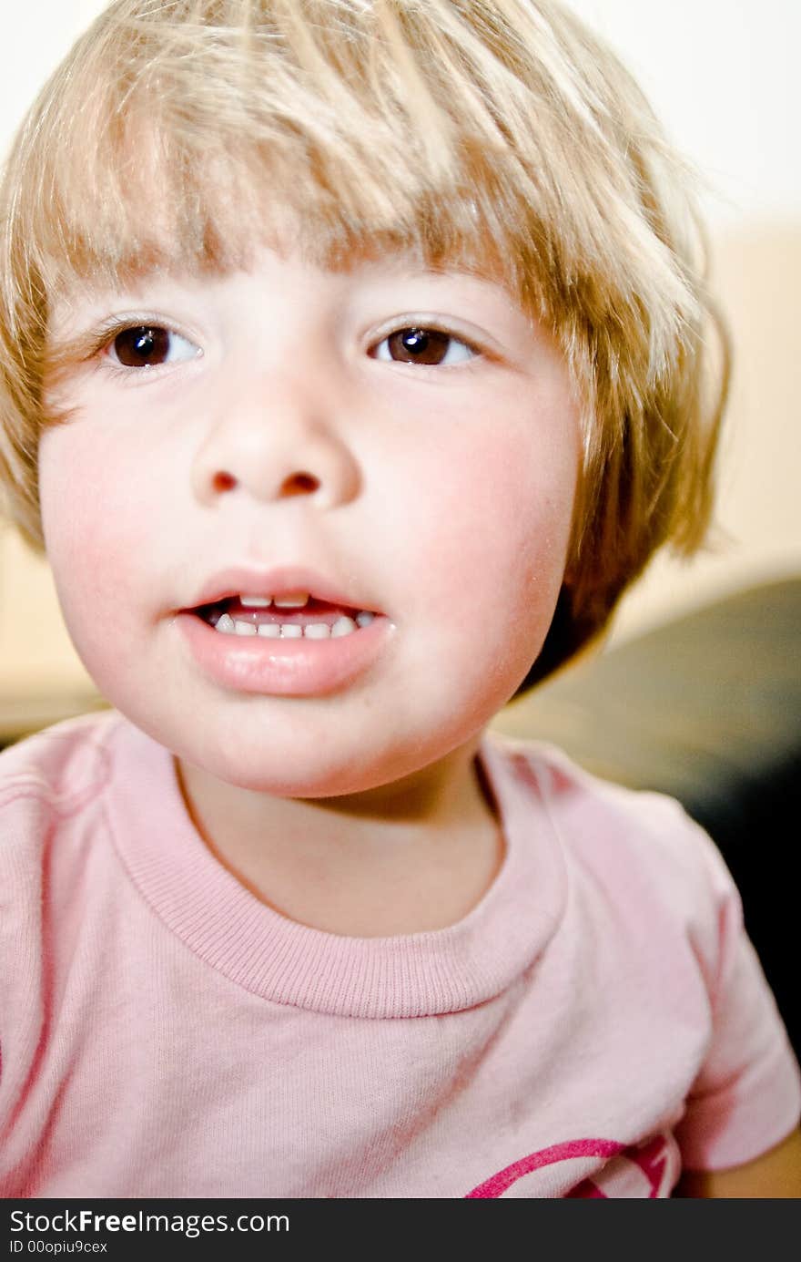 Three year old girl making faces. Three year old girl making faces