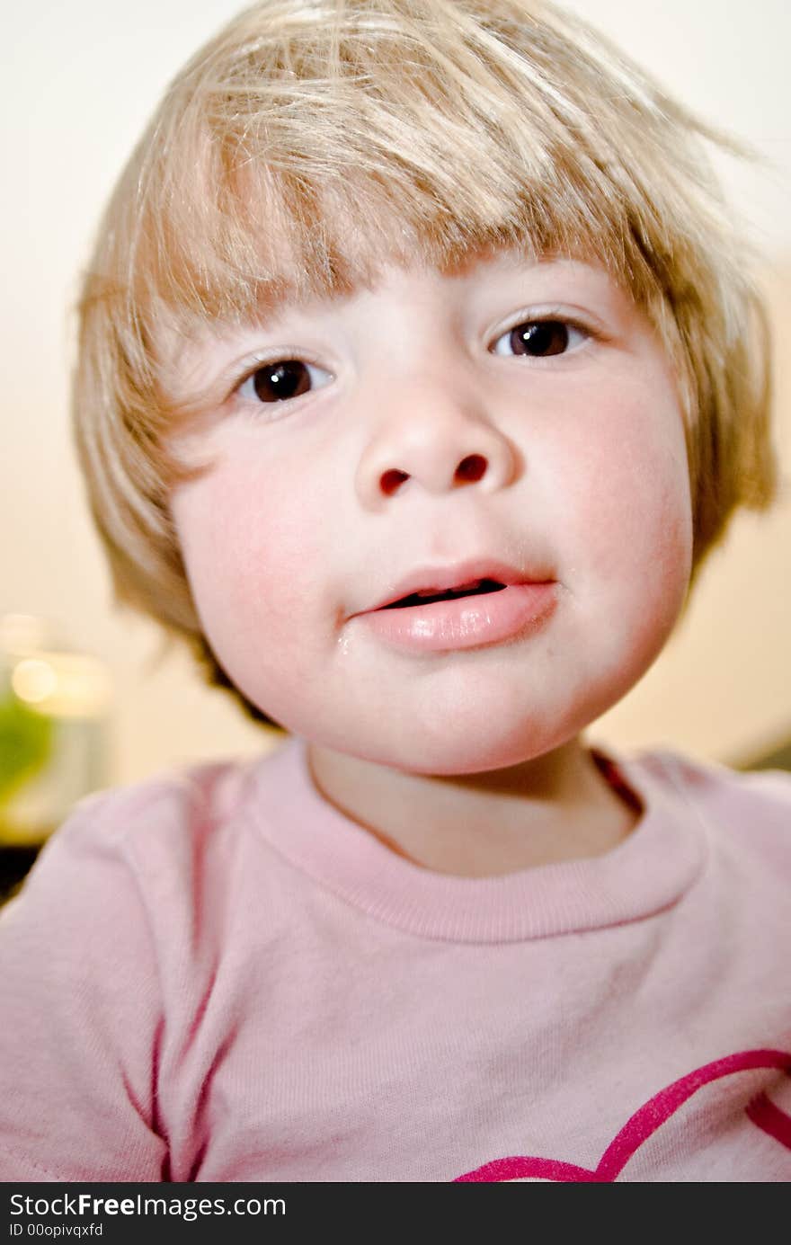 Three year old girl making faces. Three year old girl making faces