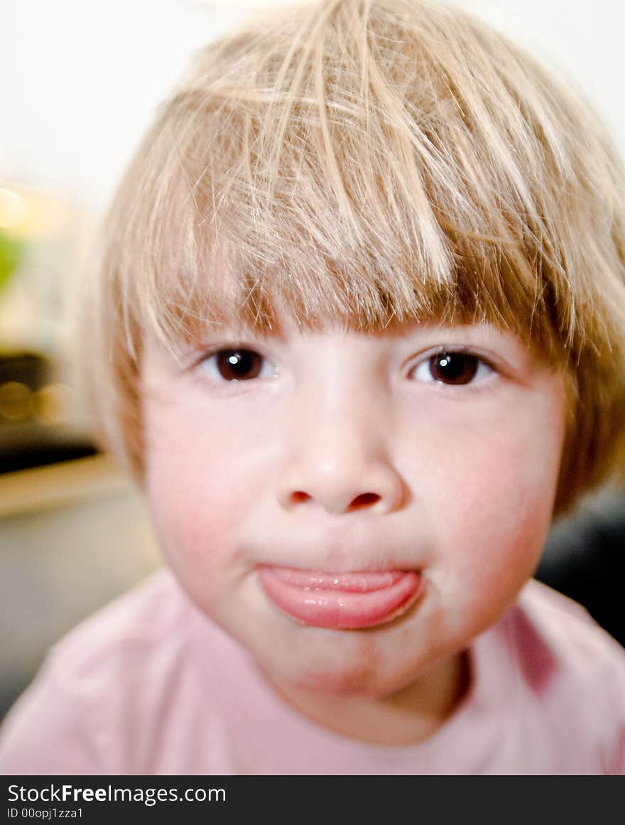 Three year old girl making faces. Three year old girl making faces