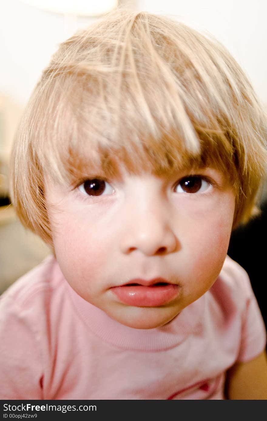 Three year old girl making faces. Three year old girl making faces