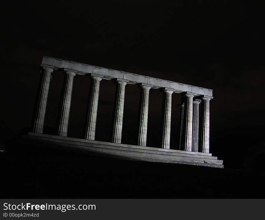 A night view of the Edinburgh Monument, known as Edinburgh's Folly, perched upon Calton Hill. A night view of the Edinburgh Monument, known as Edinburgh's Folly, perched upon Calton Hill.