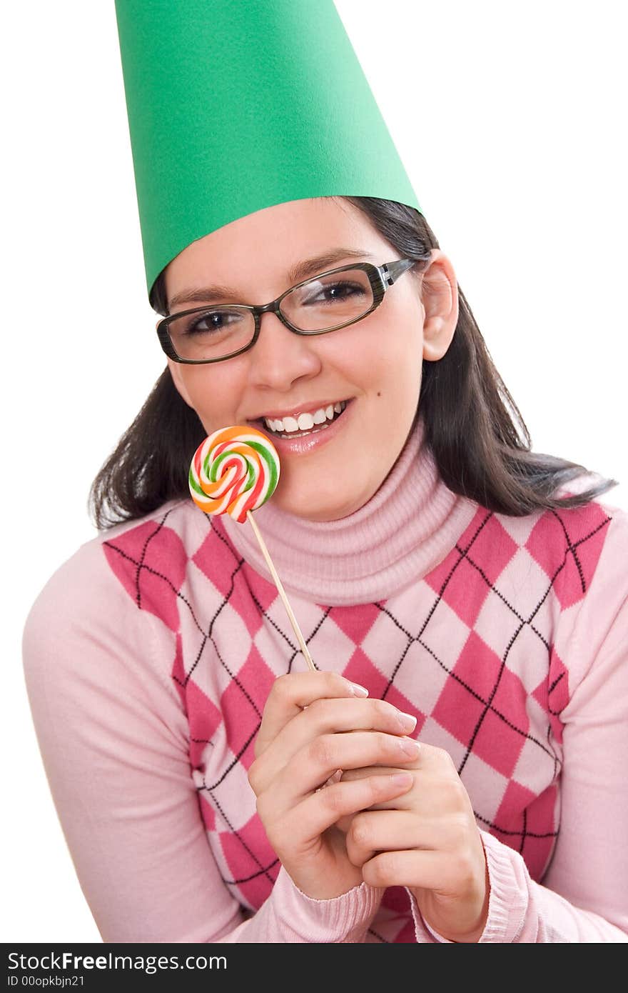 Young girl celebrating her birthday isolated on white