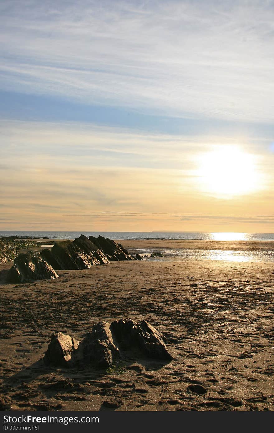 A beach landscape full of rocks and sand. A beach landscape full of rocks and sand