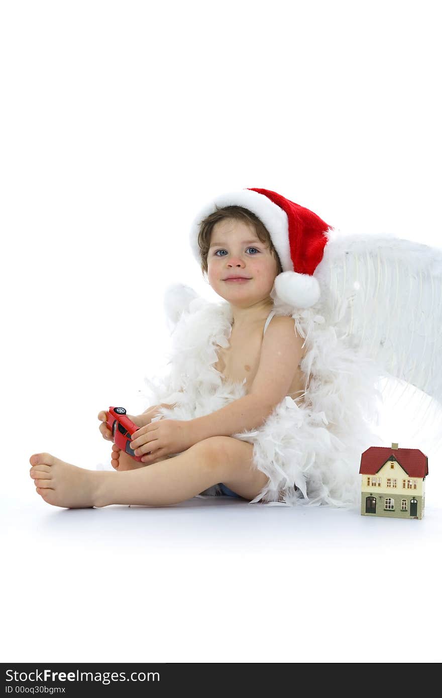 Little angel with car and house on isolated background